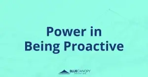 Navy blue text against a bright aqua blue background that says "Power in Being Proactive"