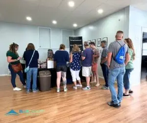 Visitors gathered at the Blue Canopy Marketing building during the Meadville Chamber's Wine, Brew, & Spirits Walk.