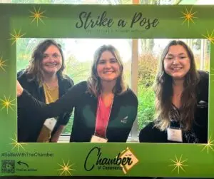 Blue Canopy Marketing team members Marge, Natalie, and Kathy posing at the Women in Business Expo in Meadville, PA.